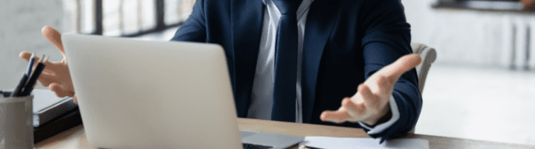 man frustrated while working on computer