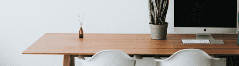 Chairs at a desk with computer